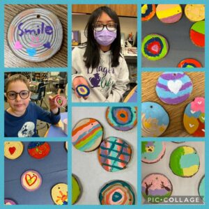 Photos of students and tree rings they painted