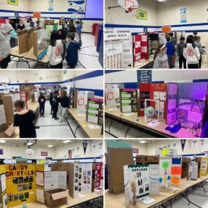 Science Fair booth shots with students browsing